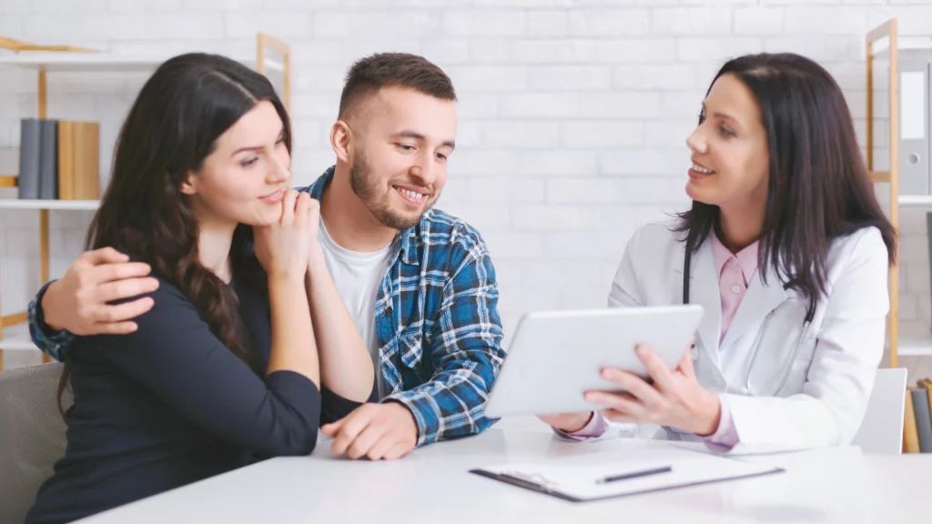 intended parents taking with a fertility specialist